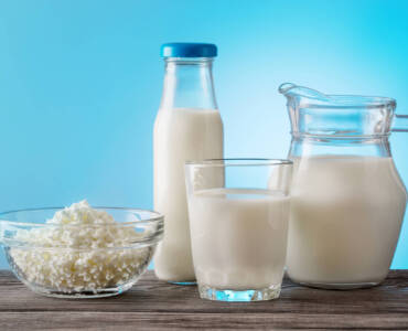 still-life-of-dairy-products-on-wooden-table-P56KXPV-scaled.jpg